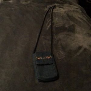 Cute phone, ID, lipstick, $ crossbody purse.